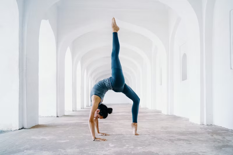 woman in a balanced yoga pose