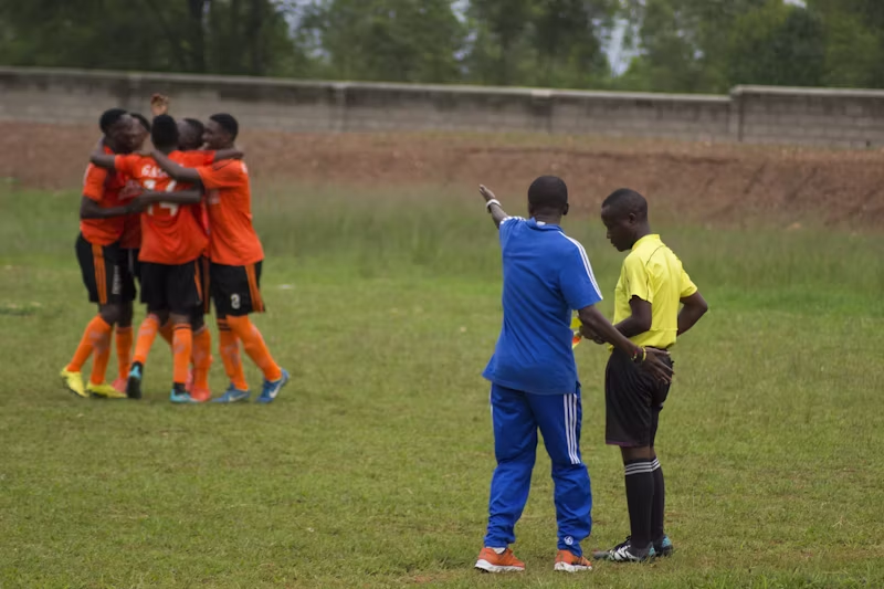 coach talking to a referee