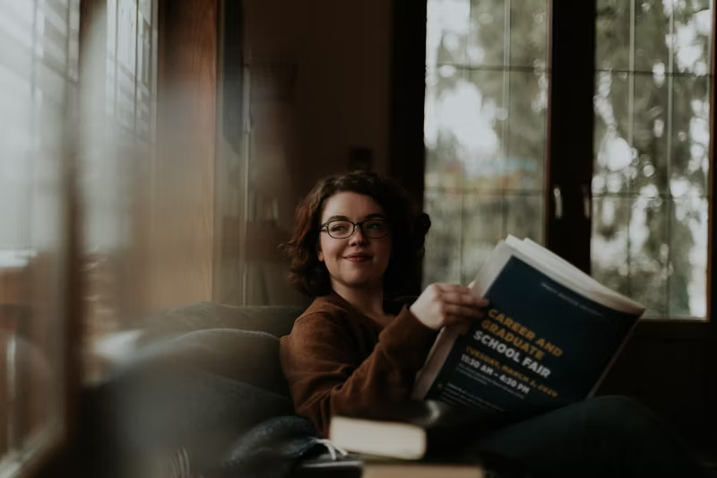 woman reading the newspaper