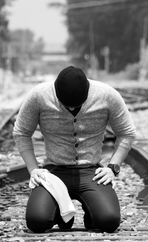 man kneeling