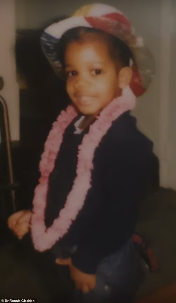 Dr Ronnie (pictured) started experiencing transgracial feelings as a four-year-old - and they have continued throughout his life
