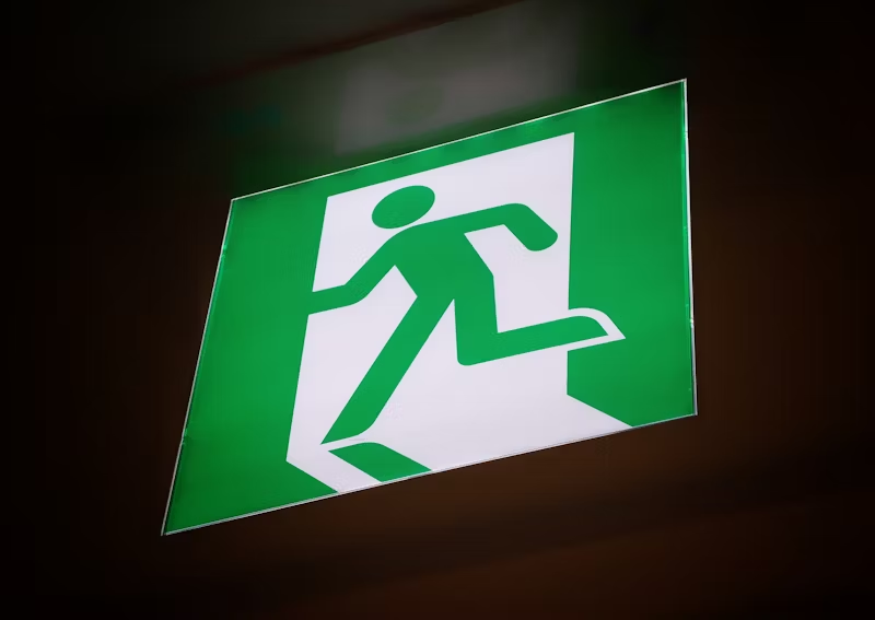 sign of a person exiting