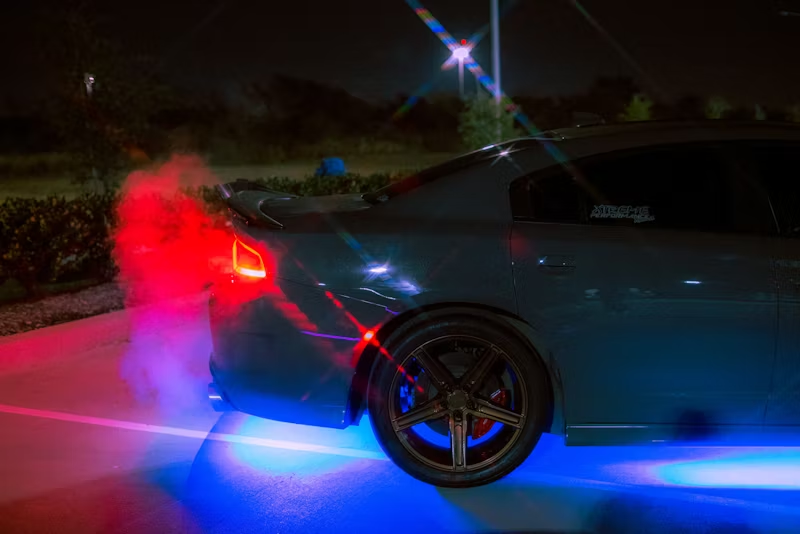 idle vehicle with exhaust fumes coming out the back