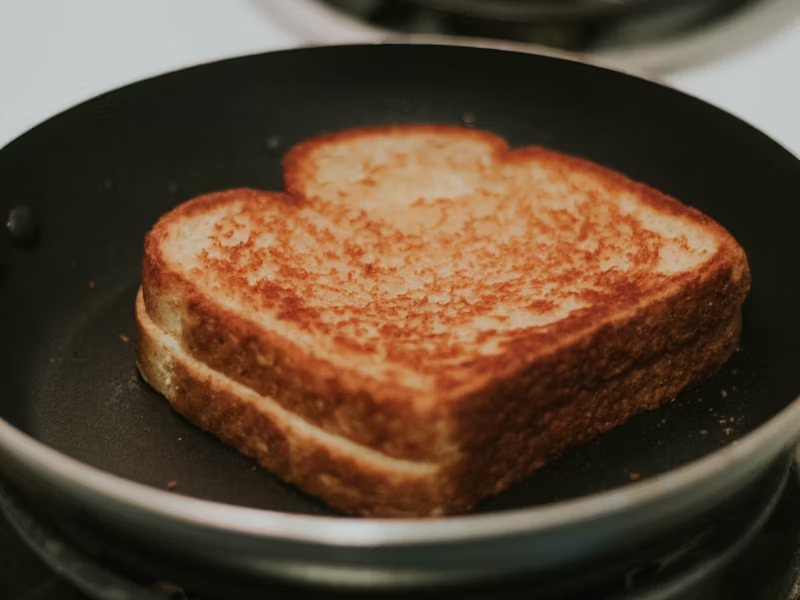 a grilled cheese sandwich being made