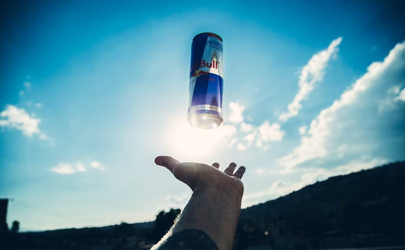 red bull tossed in the air