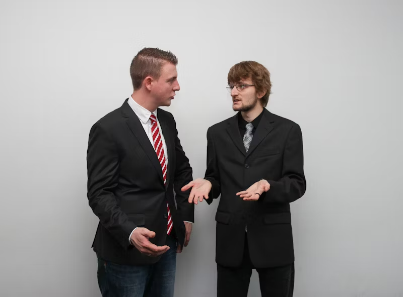 two men having a discussion