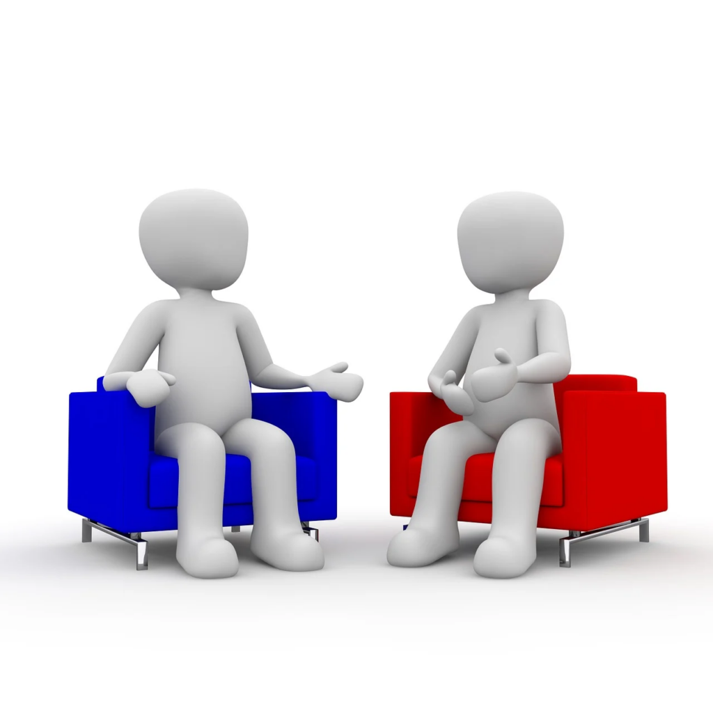 two people in opposite chairs talking to each other