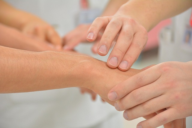 doctor touching patient hand