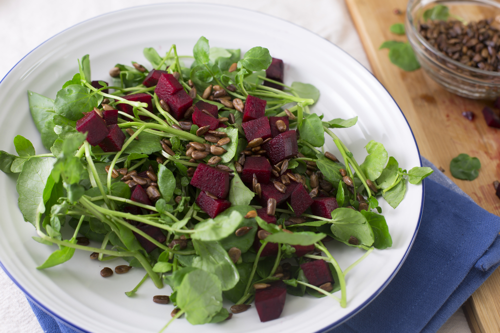 Watercress and beetroot salad with toasted sunflower seeds.
