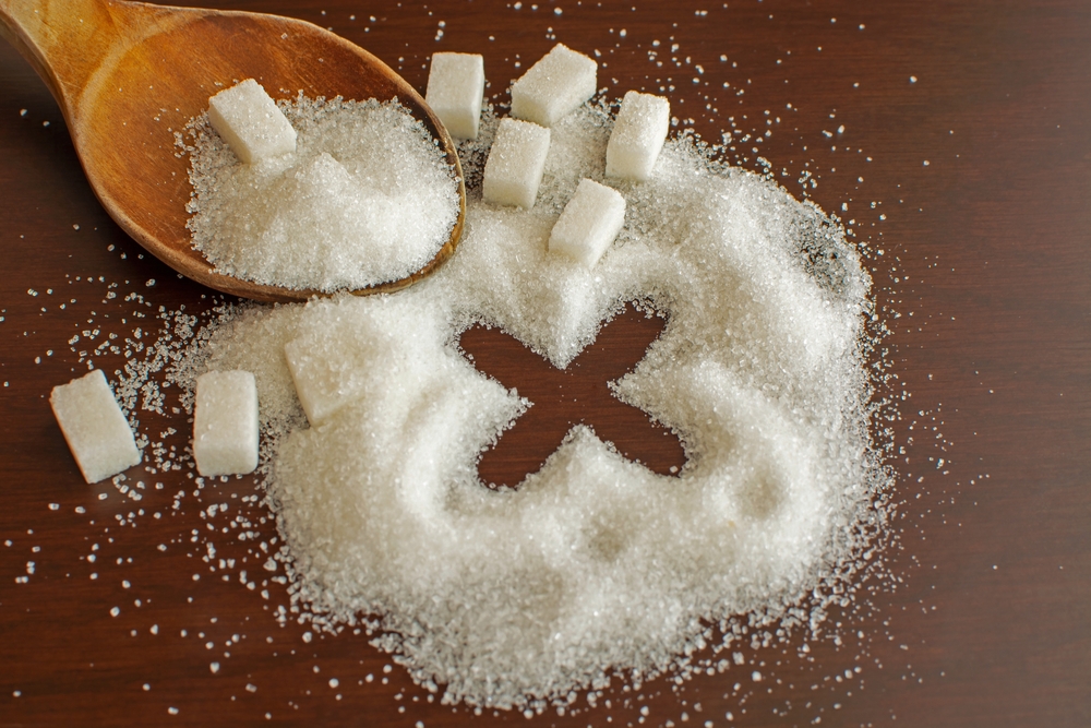 Stop sign sugar warns that too much sugar will make an unhealthy diet, obesity, diabetes, dental care and much more.
