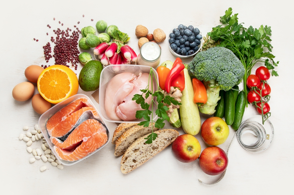 Balanced diet food background. Nutrition, clean eating food concept. Diet plan with vitamins and minerals.
