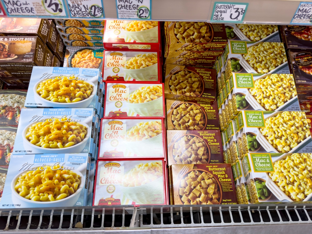 Los Angeles, California, United States - 08-14-2024: A view of assorted mac n cheese frozen entrees, on display at a local Trader Joe's.
