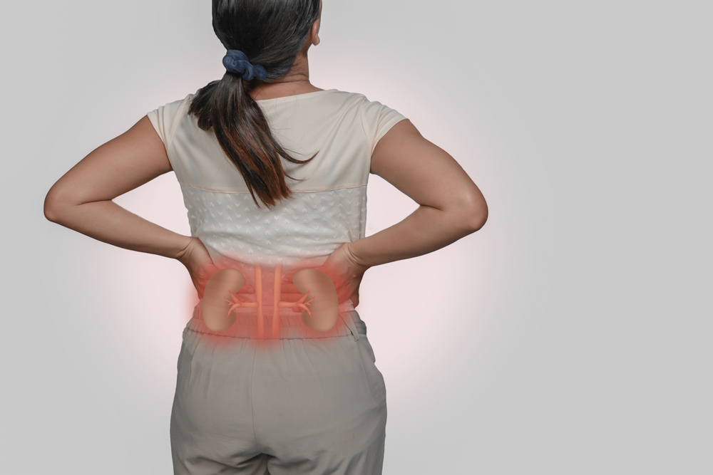 woman back Pain and Kidneys.
