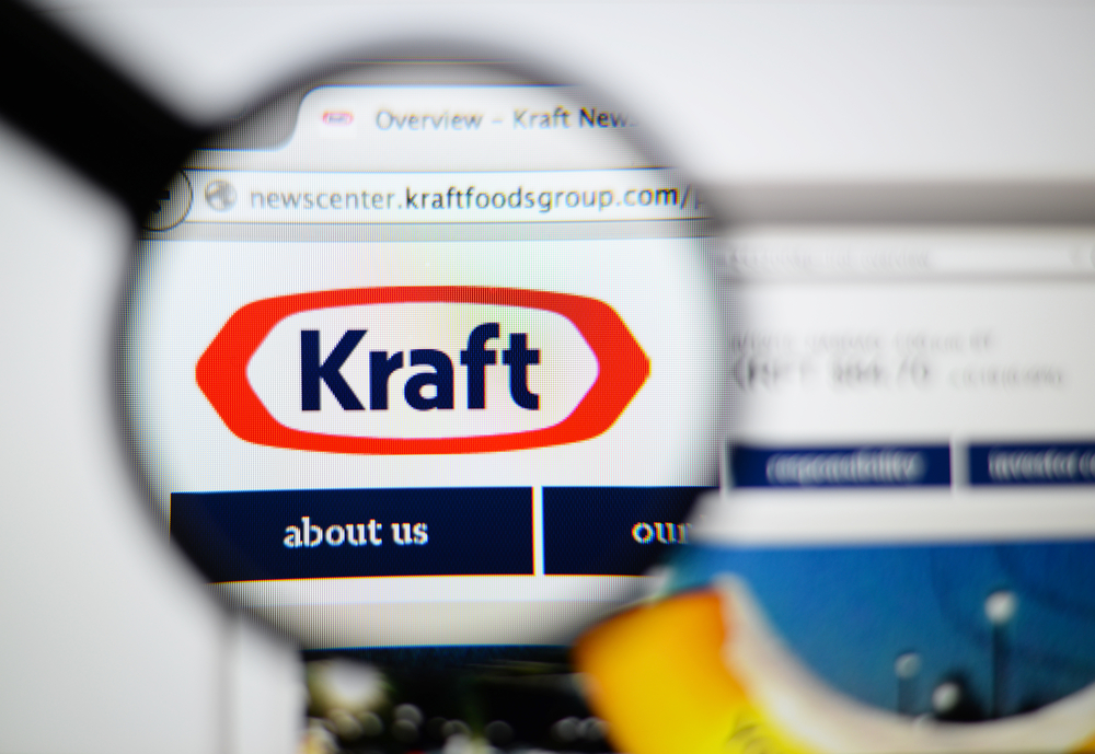LISBON, PORTUGAL - June 6, 2015. Photo of Kraft Foods homepage on a monitor screen through a magnifying glass.
