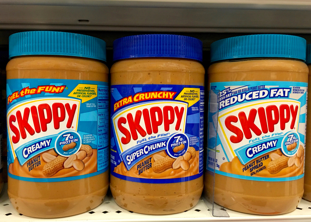Alameda, CA - June 07, 2016: Three Jars of Skippy Peanut Butter on a store shelf. Creamy, Super Chunky and Low Fat. Skippy is the 2nd most popular Peanut Butter in the world.
