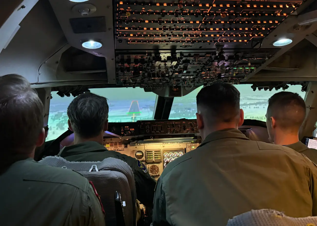 An E-4B simulator training mission. 