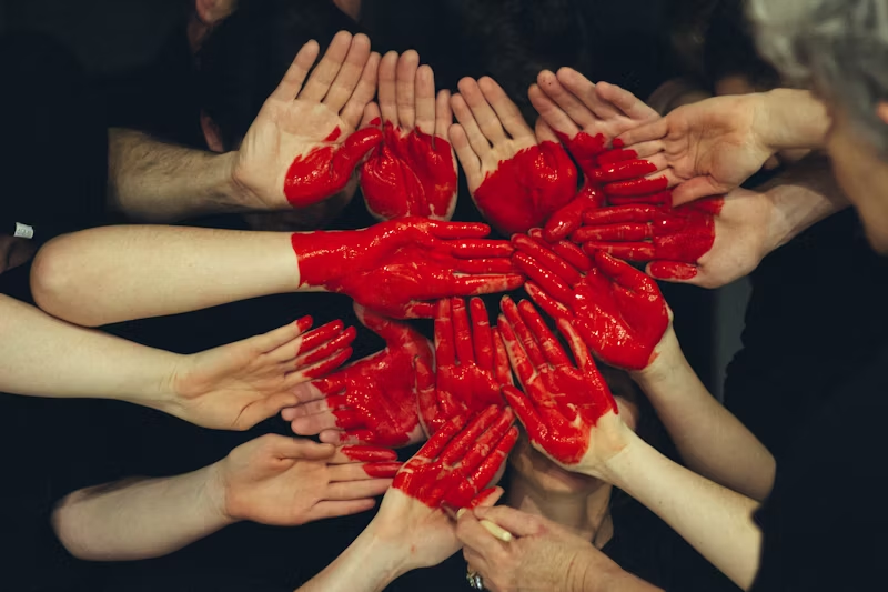 a heart made of many hands