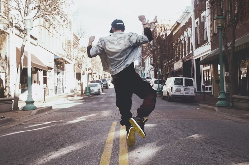 a man dancing in the street