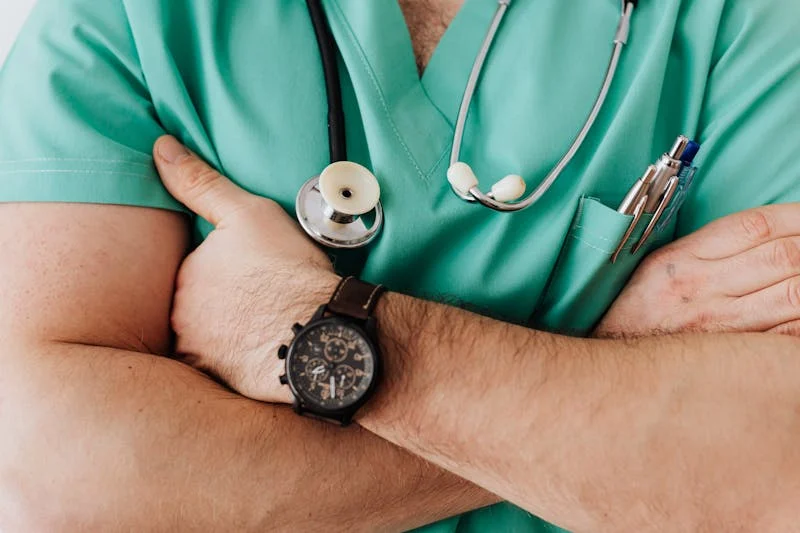 a doctor with his hands crossed