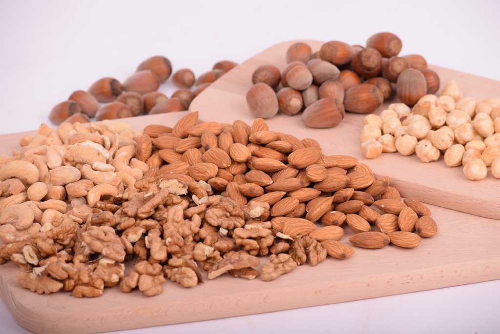 cutting board covered in nuts