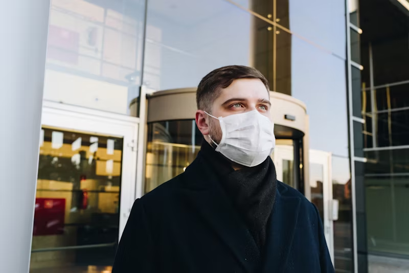 Man with an N95 mask on