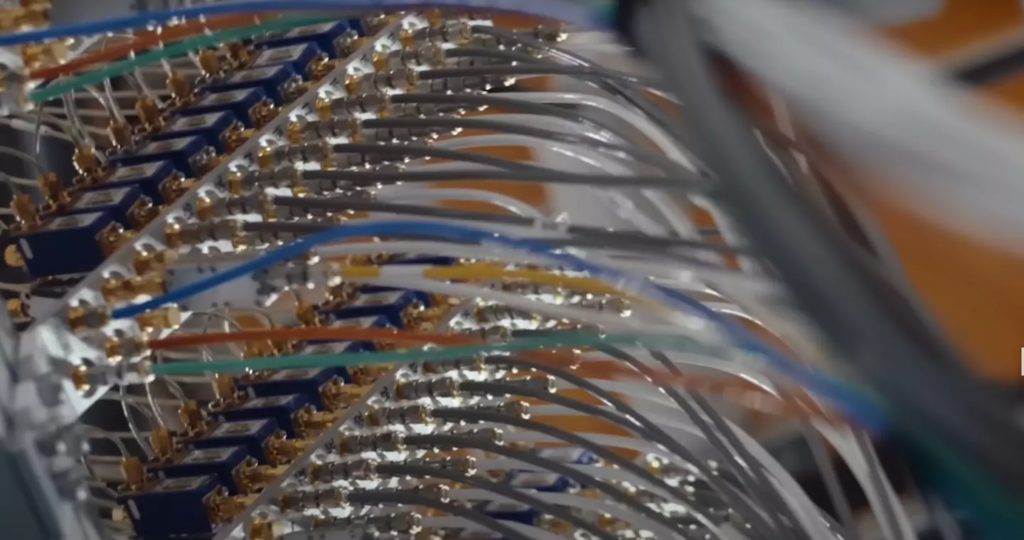 Apparently, all these wires help to draw information from parallel universes