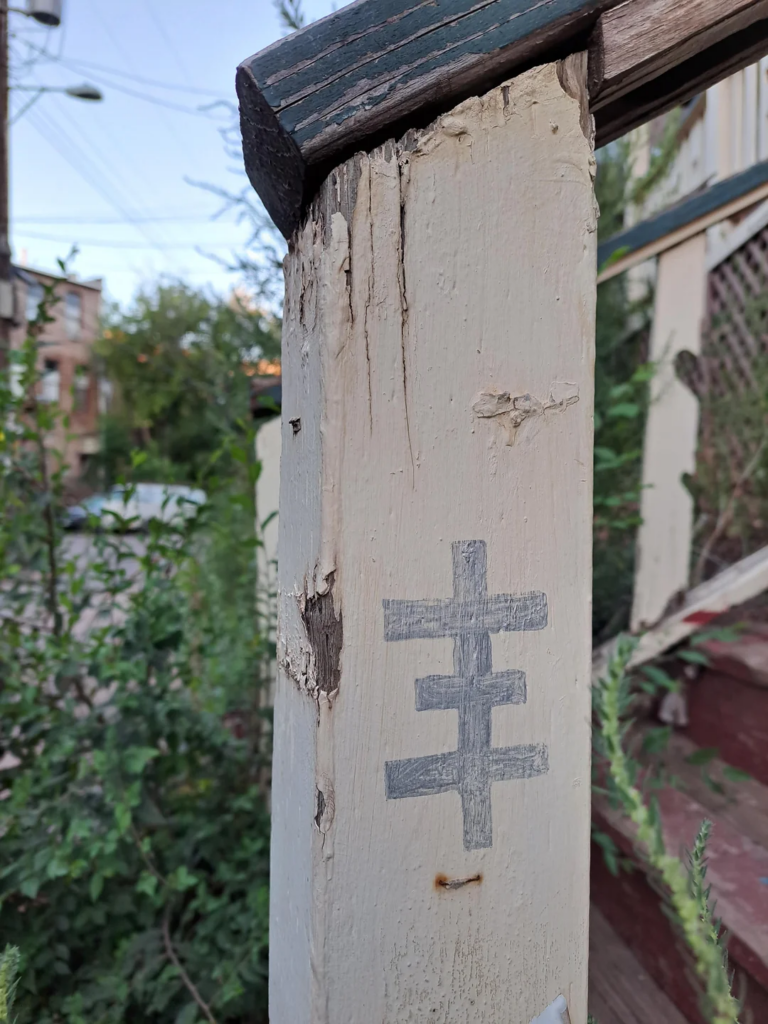 Strange symbol on a post
