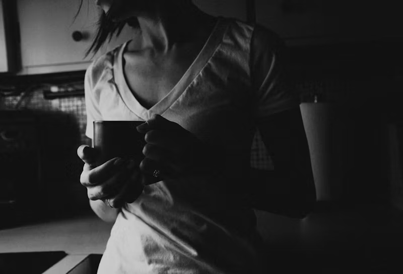 a person with a morning cup of coffee