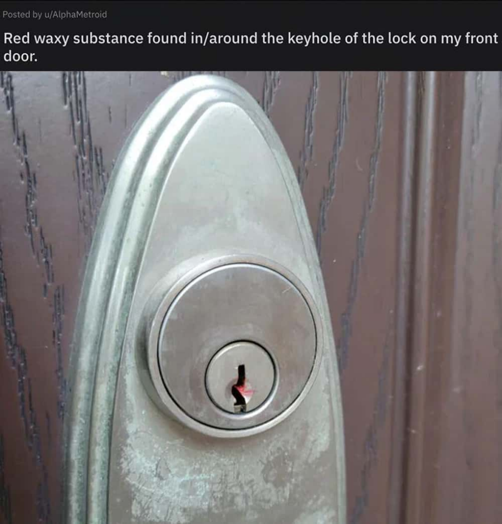 Red waxy substance on a key lock