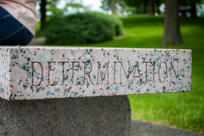 a sign that reads "determination"