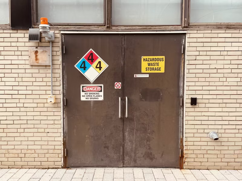a room with assorted chemicals and hazards inside