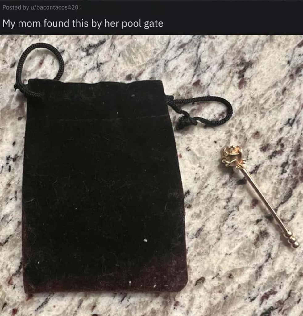 Pouch found beside pool gate