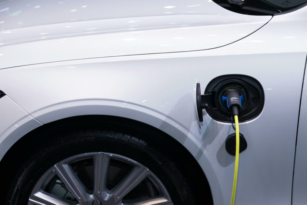 electric vehicles being charged at a station