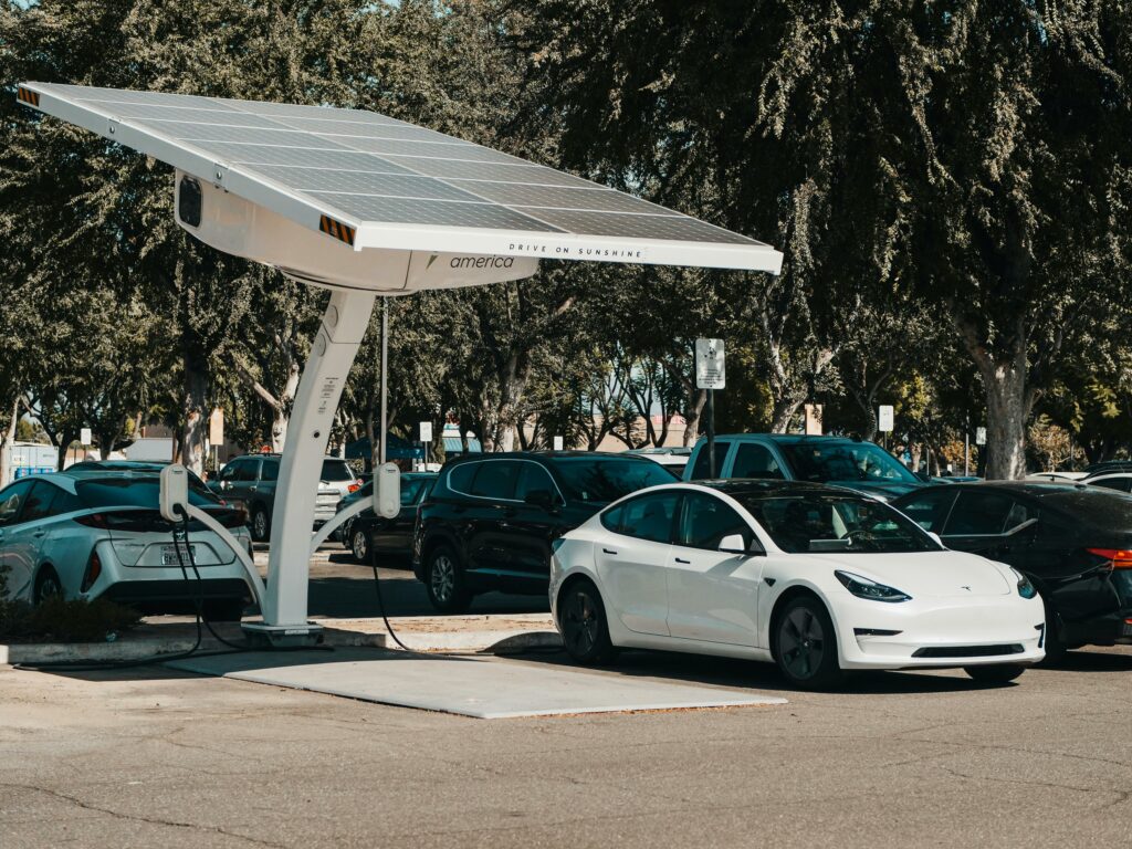 electric vehicles being charged at a station