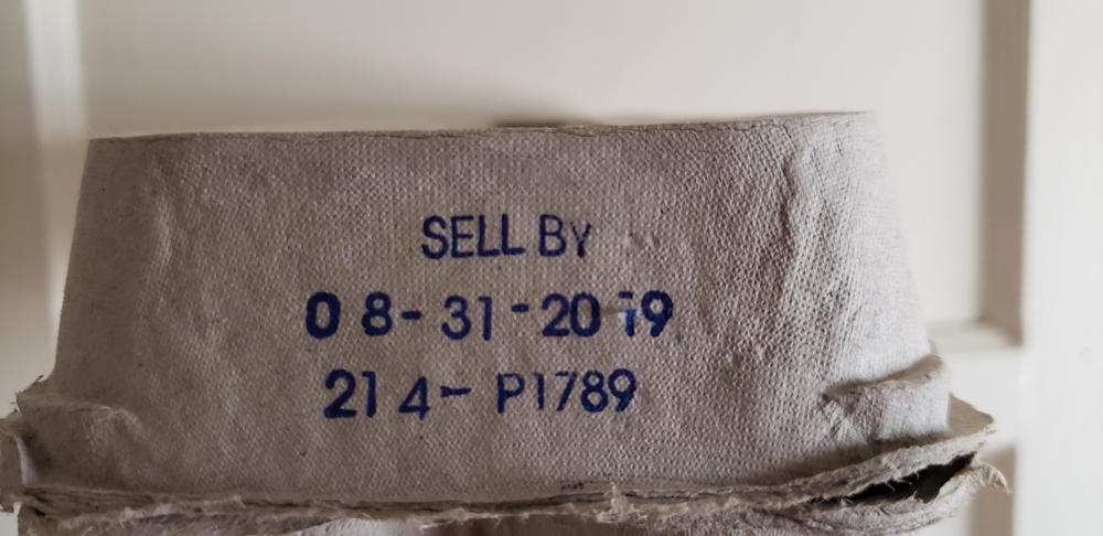 "Los Angeles, CA / USA - August 29, 2019: Sell By Date 08-31-2019 Expired Eggs Possible Salmonella Poisoning. Plain Egg Carton.