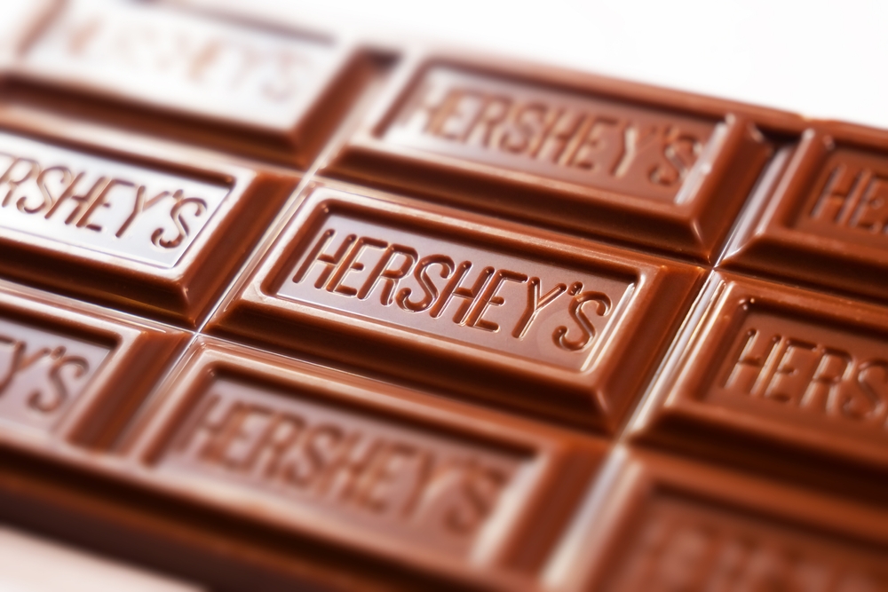 WARSAW, POLAND - MARCH 10, 2023: A Hershey's Milk Chocolate Chocolate Bar close up shallow depth of field studio shot isolated on white background