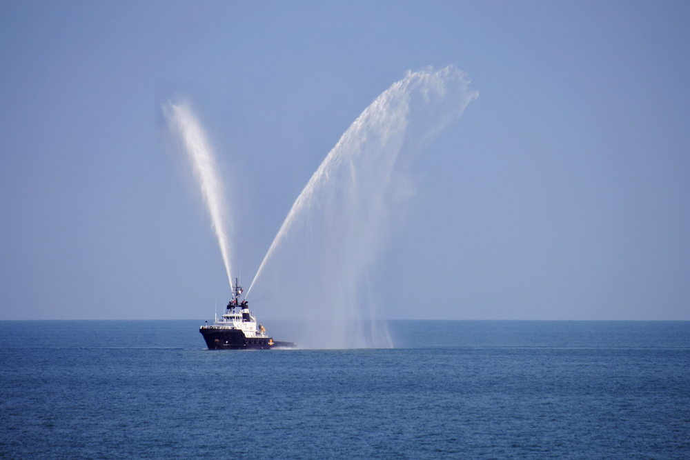 Tug showing fire fighting jets
