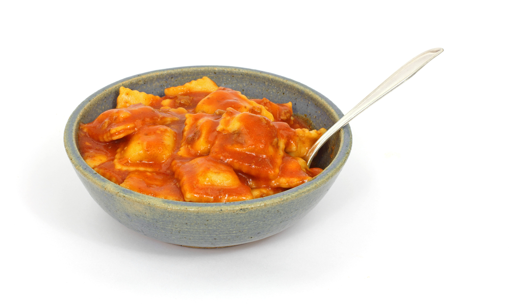 Canned ravioli pasta filled with meat and tomato sauce.