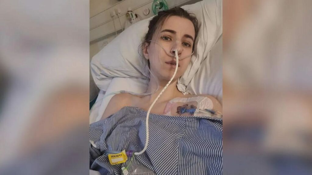 Faye Louise undergoing treatment in hospital bed