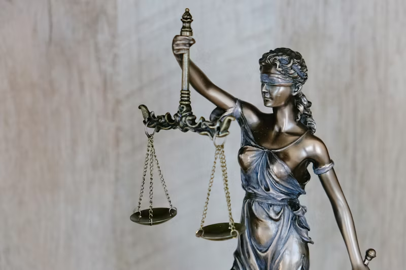 Lady justice (Greek god Themis) holding the scales