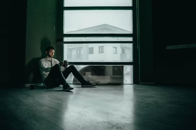 a man alone on his phone