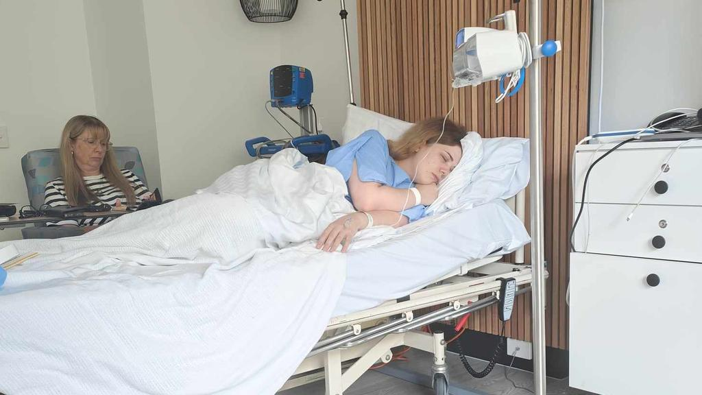 Emily Norton in hospital bed