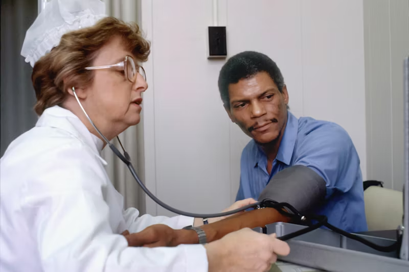 a man getting his blood pressure checked