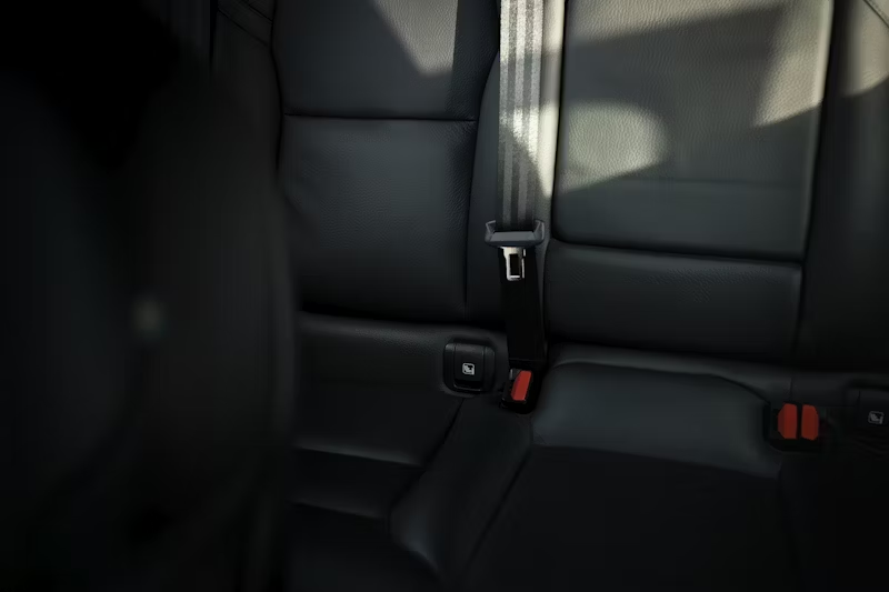 back seat and seat belts in a car