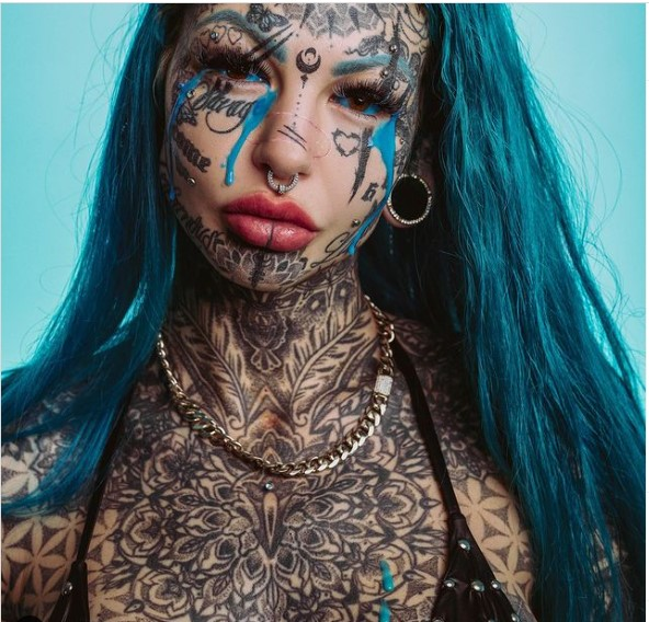 A photo re-enacting the time Amber cried blue tears because of her tattooed eyes.