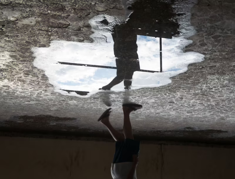 person walking with a refelction