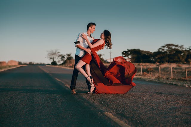 a couple dancing in the street