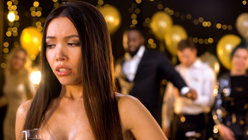 Beautiful female feeling uncomfortable at party, awkward moment, menstruation

