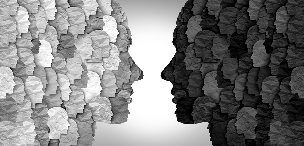 Divided social groups and culture war between conservative and liberal political clash of ideas or community psychology.