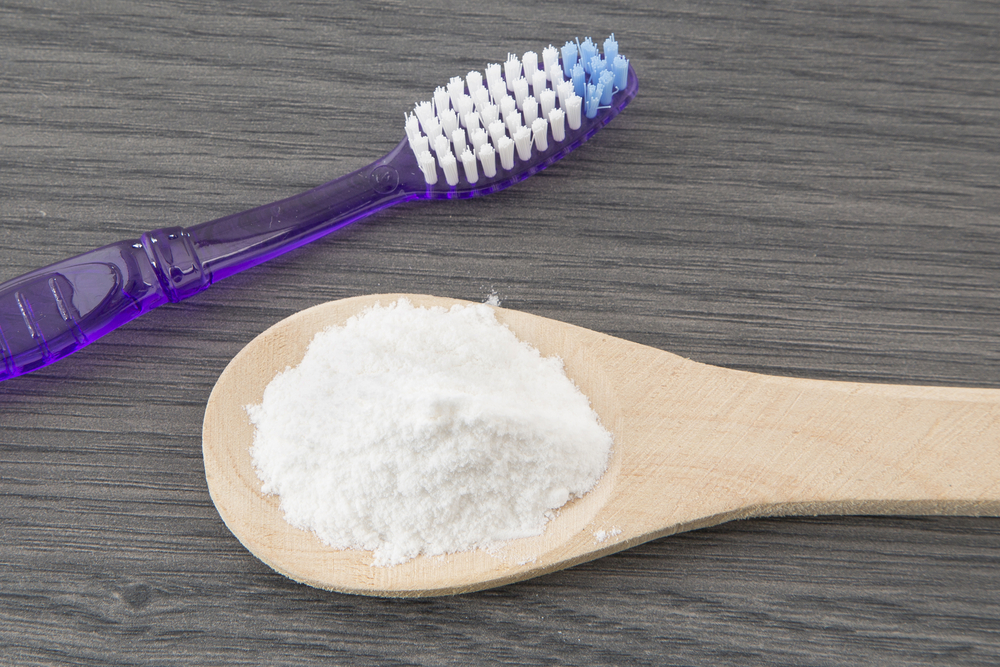 Toothbrush and baking soda to clean